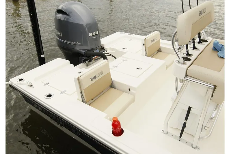 Slide: The Image of Manufacturer Provided Image: 2022 Pathfinder 2200 TRS boat with Yamaha 200 outboard motor, docked on water. - 65