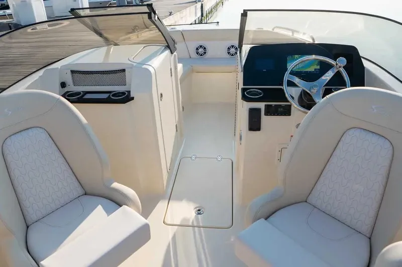 Slide: The Image of Manufacturer Provided Image: 2026 Scout 220 Dorado boat interior with dual seats and modern dashboard. - 6