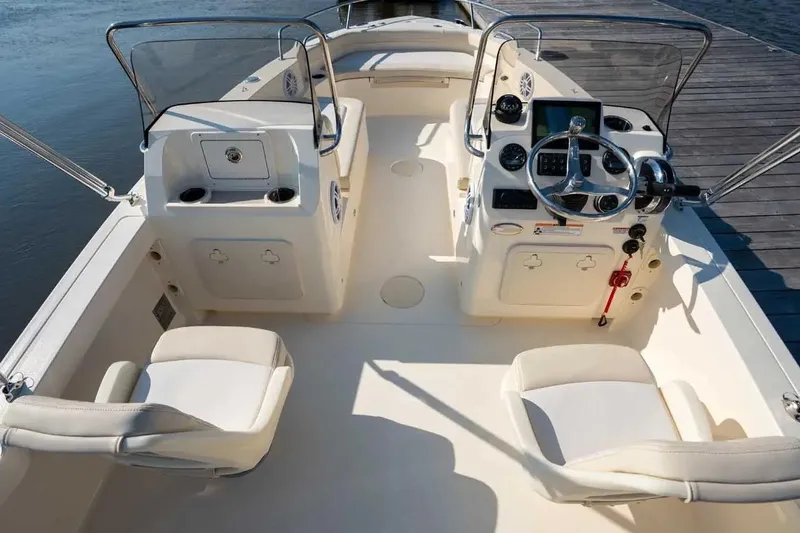 Slide: The Image of Manufacturer Provided Image: 2026 Scout 188 Sport Dorado boat interior with dual seats and steering console. - 4