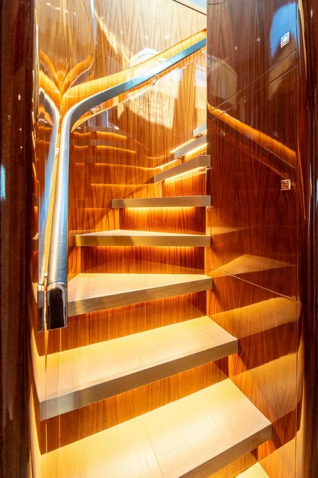 Slide: The Image of Luxurious wooden staircase on Horizon E88 yacht, built in 2013. - 10