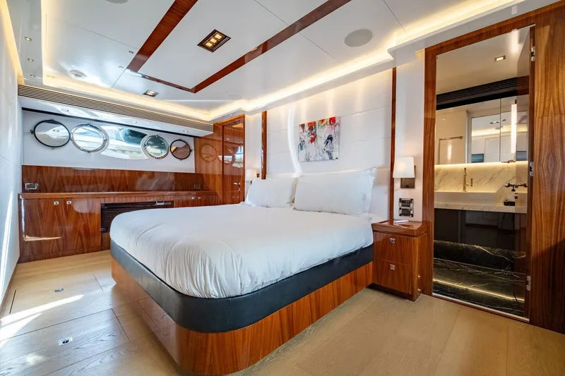 Slide: The Image of Luxurious bedroom on the Horizon E88 yacht, built in 2013. - 12
