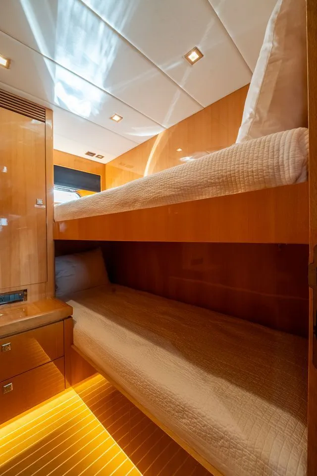 Slide: The Image of Interior of a 2013 Horizon E88 yacht with bunk beds. - 25