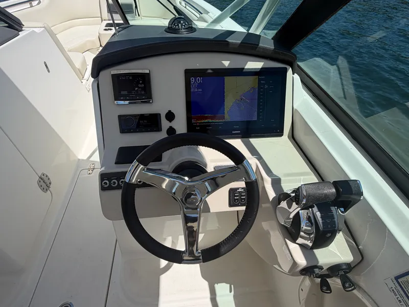 Slide: The Image of Helm console of a 2016 Boston Whaler 270 Vantage boat. - 10