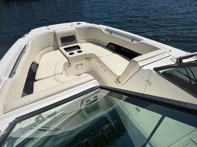Slide: The Image of 2016 Boston Whaler 270 Vantage with luxurious seating on the water. - 14