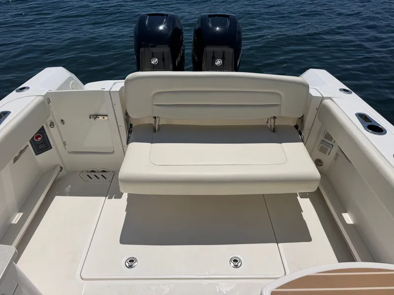 Slide: The Image of 2016 Boston Whaler 270 Vantage with seating and engines. - 19