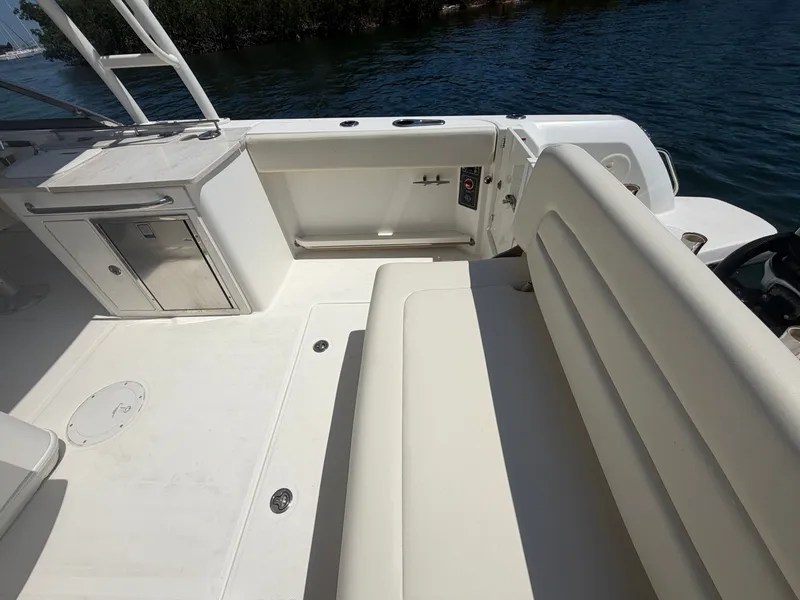 Slide: The Image of Interior of a 2016 Boston Whaler 270 Vantage boat with seating area. - 21