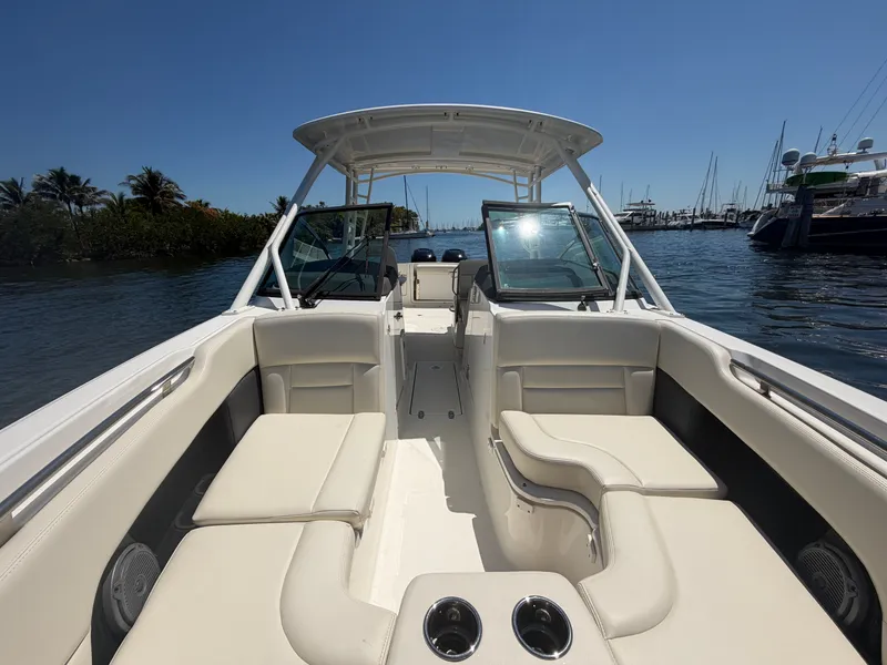 Slide: The Image of Interior view of a 2016 Boston Whaler 270 Vantage boat in harbor. - 26