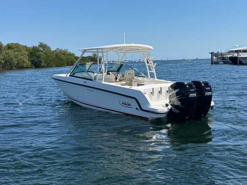 Slide: The Image of 2016 Boston Whaler 270 Vantage boat on calm water. - 3