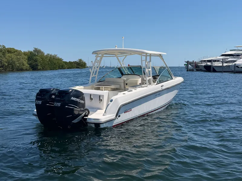 Slide: The Image of 2016 Boston Whaler 270 Vantage boat on calm water. - 5