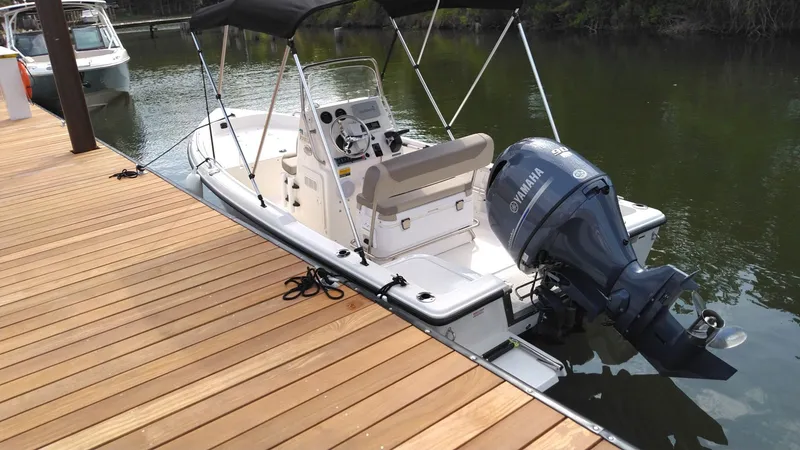 Slide: The Image of 2022 Key West 1720 boat docked with Yamaha outboard motor. - 8