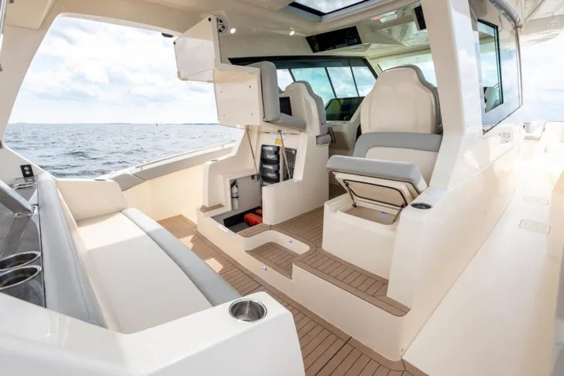 Slide: The Image of Manufacturer Provided Image: Luxurious 2025 Scout 530 LXF boat interior with modern seating and ocean view. - 15