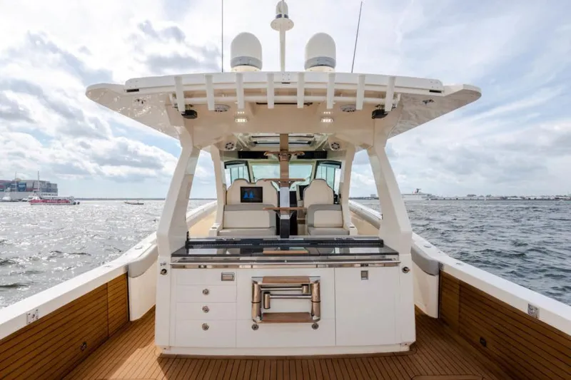 Slide: The Image of Manufacturer Provided Image: 2025 Scout 530 LXF luxury yacht on open water, showcasing sleek design and spacious deck. - 19