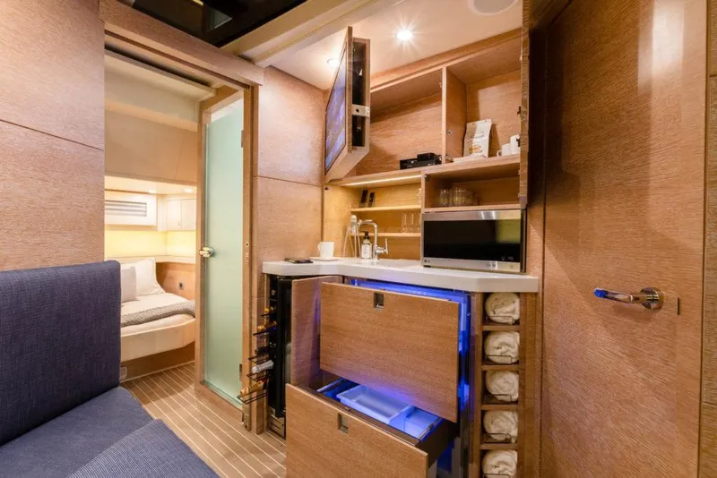 Slide: The Image of Manufacturer Provided Image: Luxurious 2025 Scout 530 LXF yacht interior with kitchenette and cozy cabin. - 22