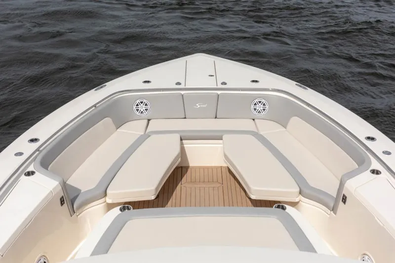 Slide: The Image of Manufacturer Provided Image: Luxurious 2025 Scout 530 LXF boat with spacious seating on calm waters. - 7