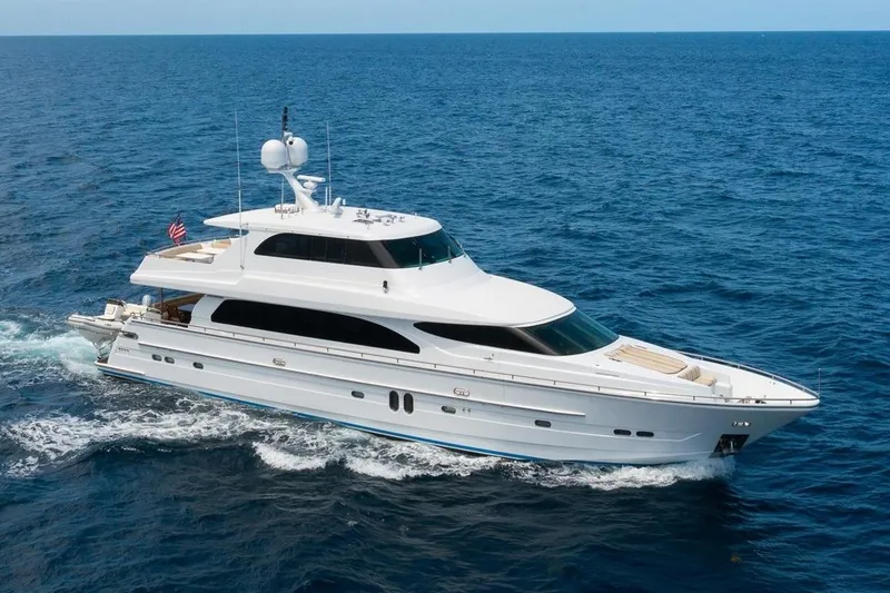 The Image of Luxurious 2007 Horizon 82 yacht cruising on open blue sea. - 0