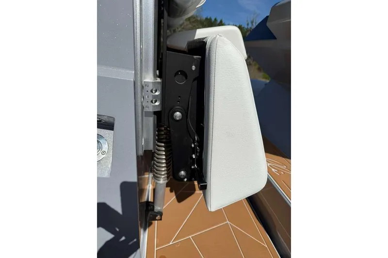 Slide: The Image of Close-up of Novielli Veloche 349 boat seat hinge, showcasing modern design and functionality. - 14
