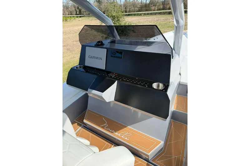 Slide: The Image of 2026 Novielli Veloche 349 boat dashboard with Garmin navigation system. - 16