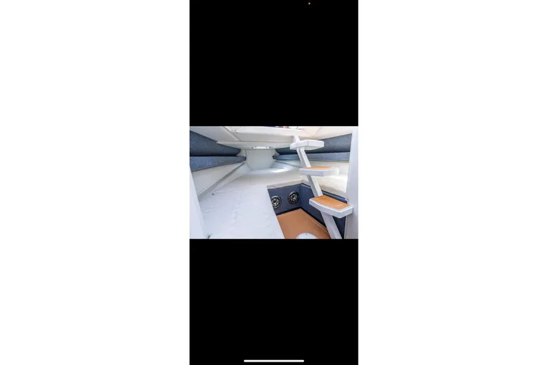 Slide: The Image of Interior of 2026 Novielli Veloche 349 boat, featuring modern seating and sleek design. - 20