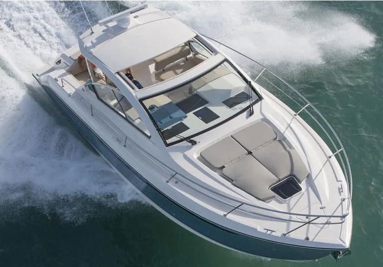 Slide: The Image of Manufacturer Provided Image: 2014 Pursuit SC 365i Sport Coupe cruising on water, top view. - 3