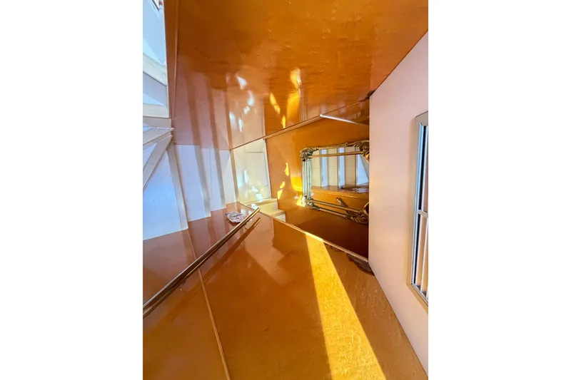 Slide: The Image of Luxurious interior of 2001 Tarrab Motor Yacht with polished wood and elegant decor. - 12