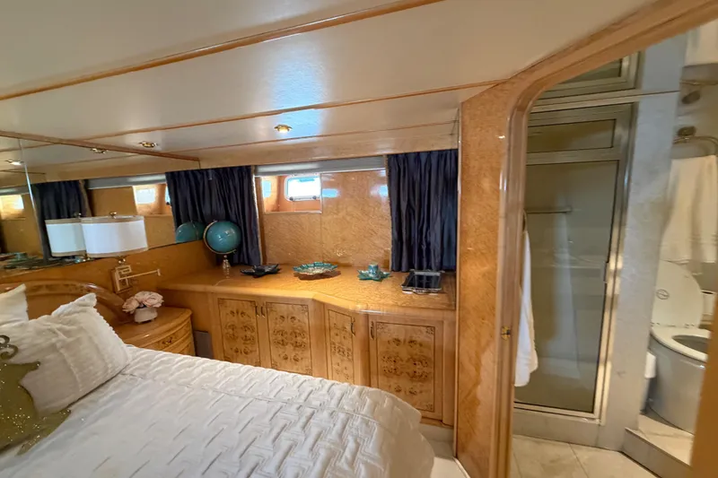 Slide: The Image of Luxurious bedroom interior of 2001 Tarrab Motor Yacht with elegant wood cabinetry and modern decor. - 19