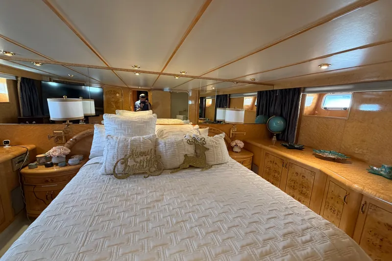 Slide: The Image of Luxurious bedroom interior of 2001 Tarrab Motor Yacht with elegant decor and plush bedding. - 20