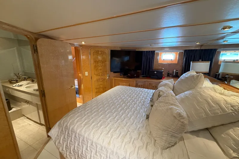Slide: The Image of Luxurious bedroom interior of 2001 Tarrab Motor Yacht with elegant furnishings and cozy ambiance. - 22