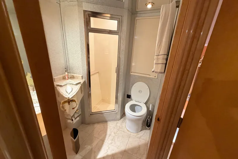 Slide: The Image of Bathroom interior of 2001 Tarrab Motor Yacht with toilet, sink, and shower. - 23