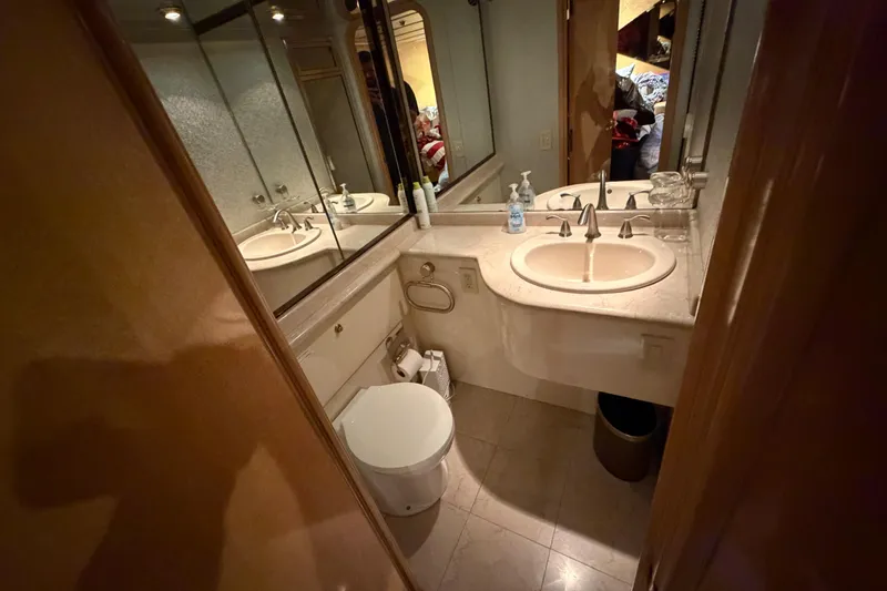 Slide: The Image of Luxurious bathroom in 2001 Tarrab Motor Yacht with modern fixtures and elegant design. - 4