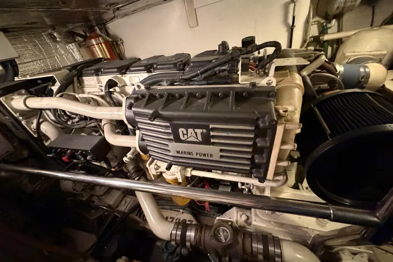 Slide: The Image of Engine room of a 2001 Tarrab Motor Yacht featuring a CAT marine power engine. - 45