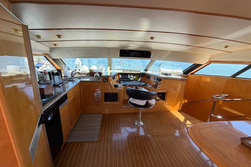 Slide: The Image of Luxurious 2001 Tarrab Motor Yacht interior with modern helm and panoramic windows. - 7