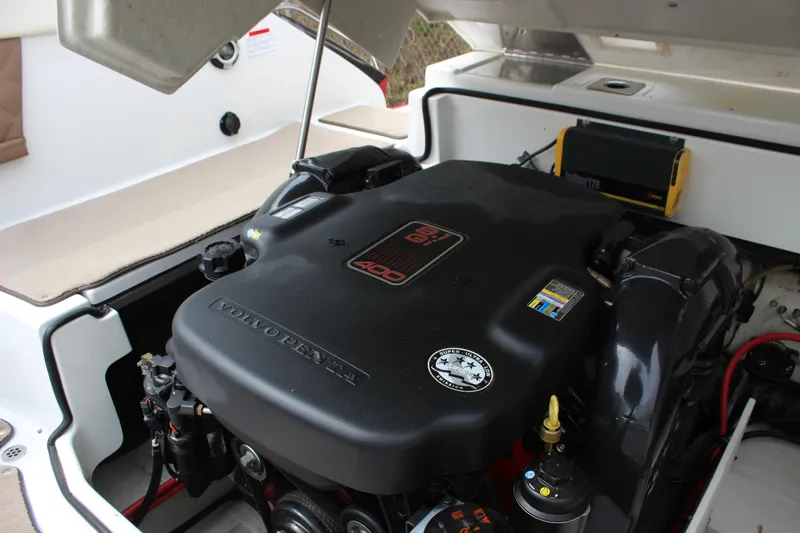 Slide: The Image of Volvo Penta engine in a 2012 Cobalt A25 boat, showcasing its powerful design. - 18