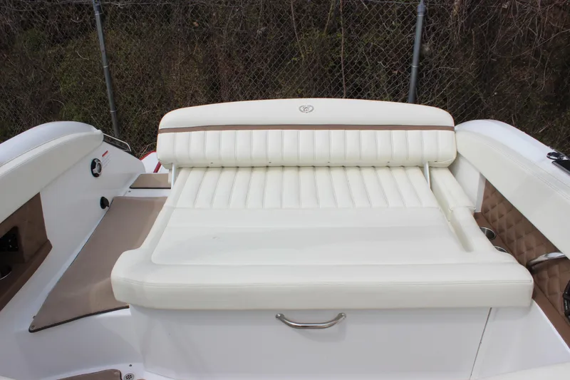 Slide: The Image of 2012 Cobalt A25 boat with white leather seating and elegant design. - 27