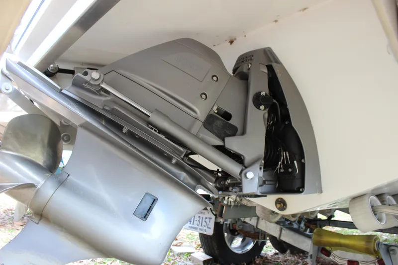 Slide: The Image of Close-up of a 2012 Cobalt A25 boat's outboard motor and propeller. - 40