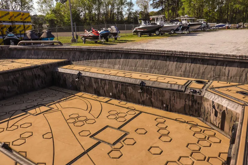 Slide: The Image of Interior of 2026 Excel 183 Tomahawk boat with geometric patterned flooring. - 14