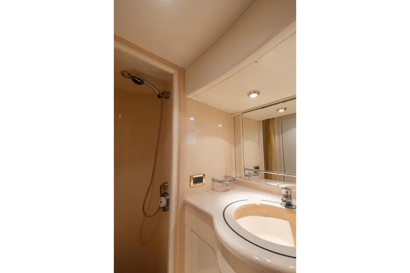 Slide: The Image of Bathroom interior of 1999 Azimut 58 yacht with shower and sink. - 29