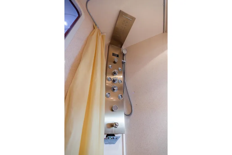 Slide: The Image of Shower panel with multiple controls in 1999 Azimut 58 yacht bathroom. - 33