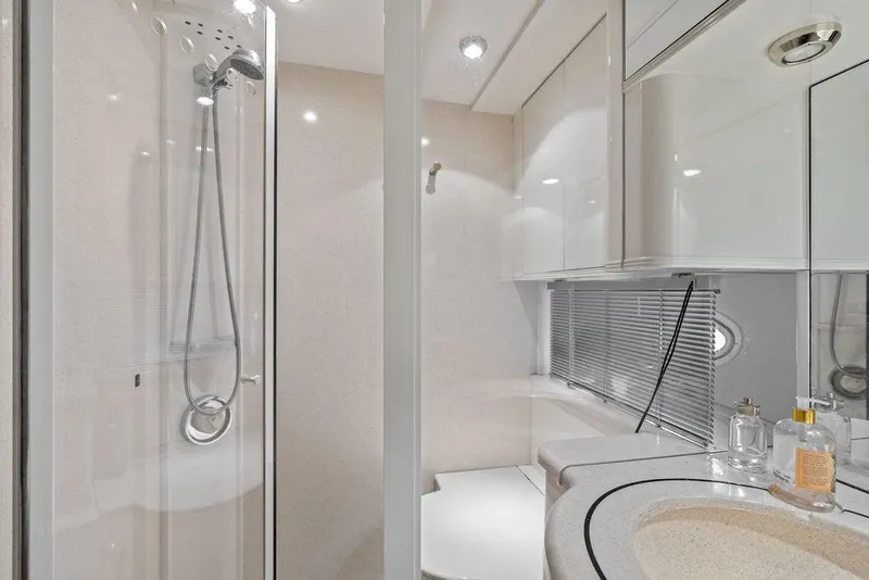 Slide: The Image of Luxurious bathroom in 1999 Azimut 58 yacht with modern shower and sleek design. - 37