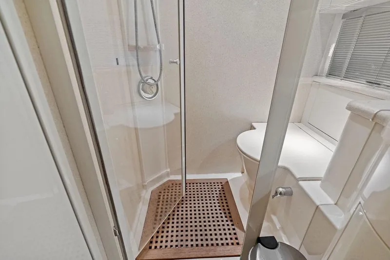 Slide: The Image of Bathroom interior of 1999 Azimut 58 yacht with shower and toilet. - 38
