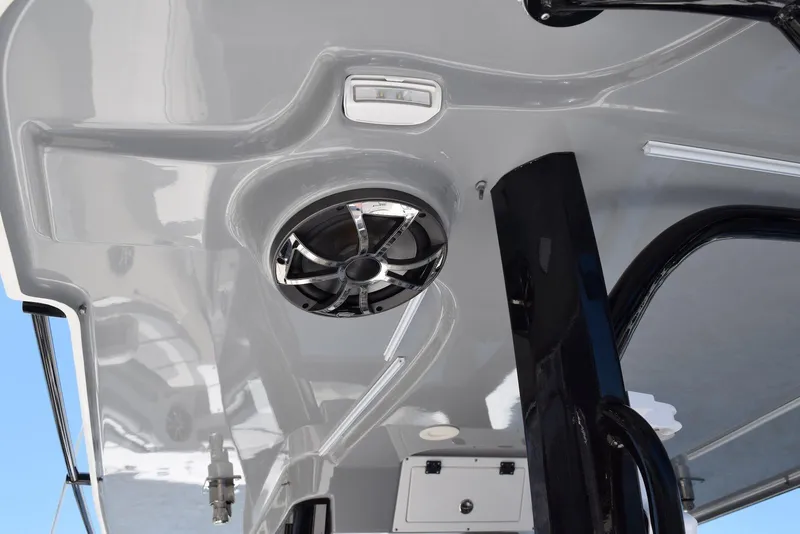 Slide: The Image of 2021 Sea Pro 320 DLX Center Console boat ceiling with speaker and lighting fixtures. - 27