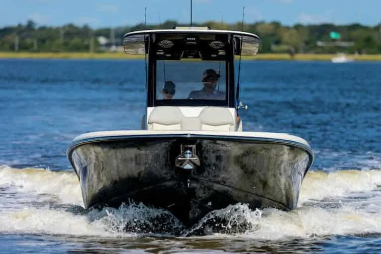 Slide: The Image of Manufacturer Provided Image: 2025 Scout 281 XSS boat cruising on open water. - 3