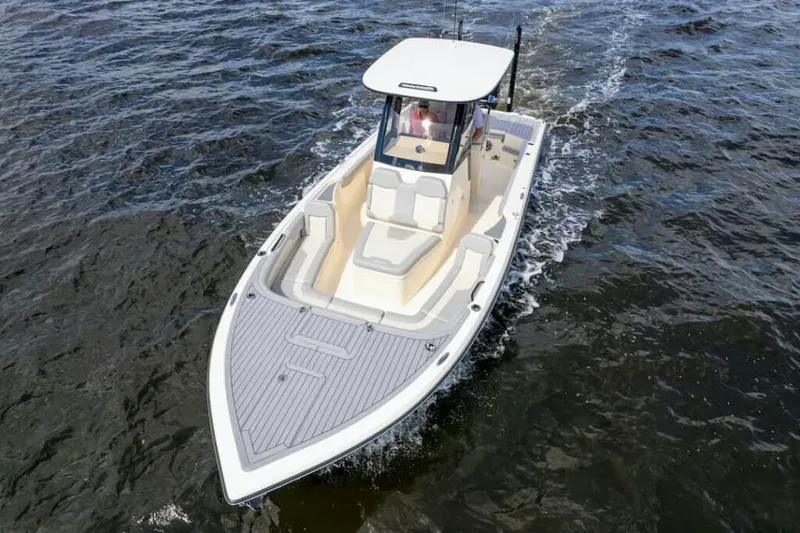 Slide: The Image of Manufacturer Provided Image: 2025 Scout 281 XSS boat cruising on open water. - 5