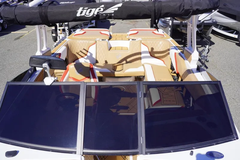 Slide: The Image of 2022 Tigé 22RZX boat with luxurious seating and sleek design, viewed from above. - 32