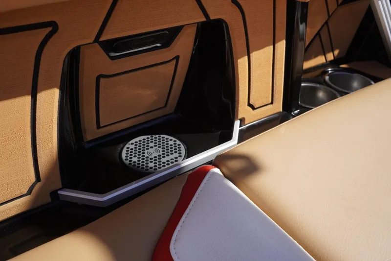 Slide: The Image of 2022 Tigé 22RZX interior detail with speaker and cup holders. - 38