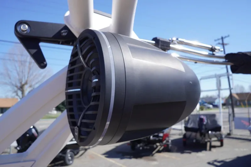 Slide: The Image of Close-up of a 2022 Tigé 22RZX boat speaker on a sunny day. - 44
