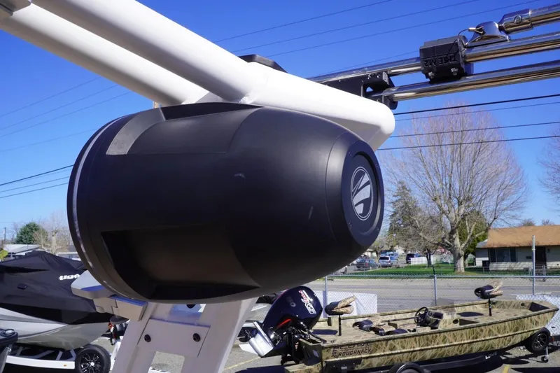 Slide: The Image of 2022 Tigé 22RZX boat speaker system with clear blue sky background. - 45