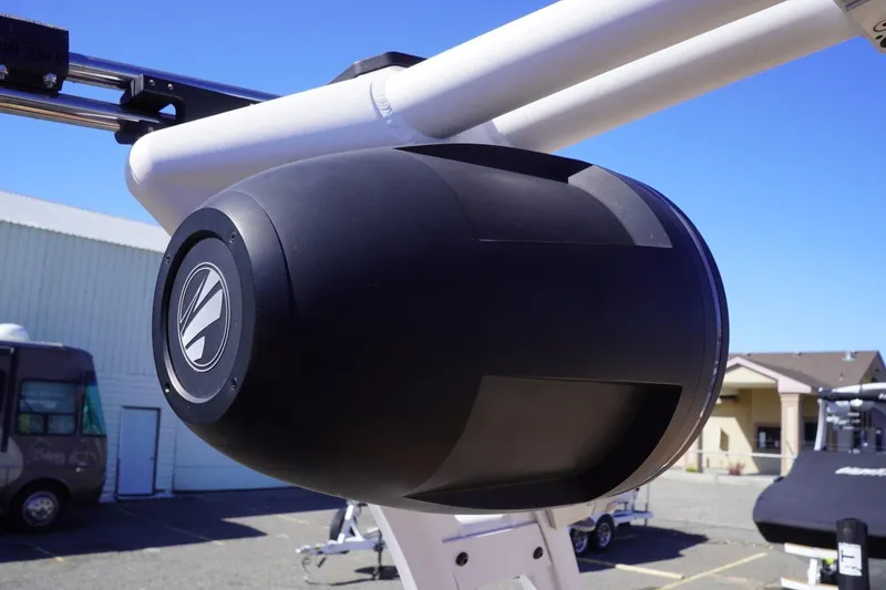 Slide: The Image of 2022 Tigé 22RZX boat speaker on a sunny day, showcasing sleek design and modern technology. - 46