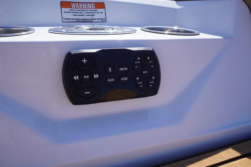 Slide: The Image of Control panel on 2022 Tigé 22RZX boat with audio and navigation buttons. - 55
