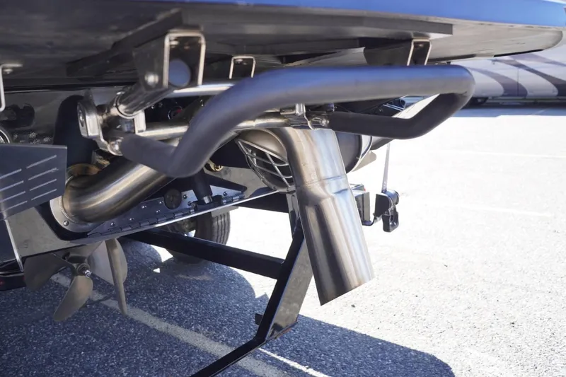 Slide: The Image of 2022 Tigé 22RZX boat exhaust system and propeller detail. - 58