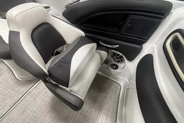 Slide: The Image of 2019 Crownline Eclipse E255 SURF interior with sleek seating and modern dashboard design. - 12